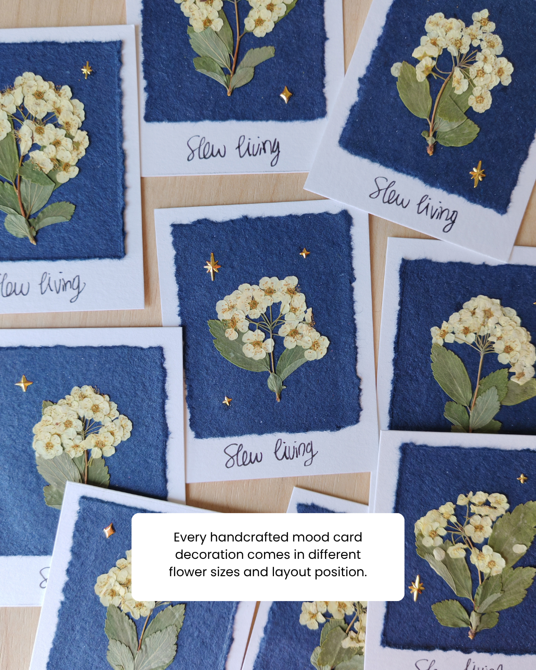 Snail mail set comes with a postcard with a paper plane flying illustrations, washi sticker in a stamp shape with paper plane and cloud illustrations, handcrafts dry pressed flower on a blue recycle paper with gold charms on it.
